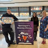 Dave Poulton of Up The Garden Bath helps open the Honesty Library in the Queensgate Shopping Centre in Peterborough