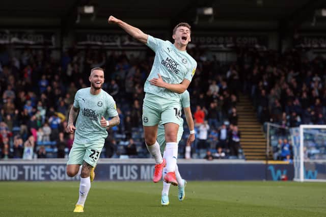 Harrison Burrows of Peterborough United celebrates his goal at Wycombe. Photo: Joe Dent/theposh.com