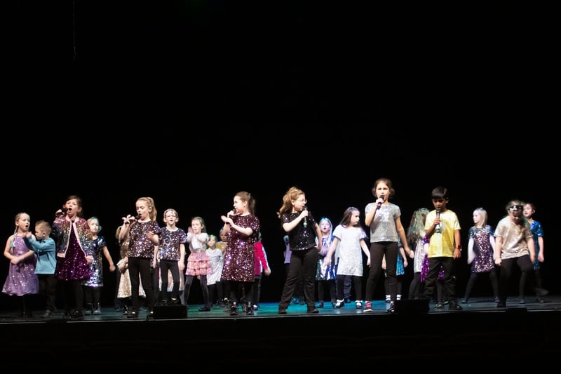 Rising Stars Musical Theatre Group on stage at the New Theatre performing Showstoppers