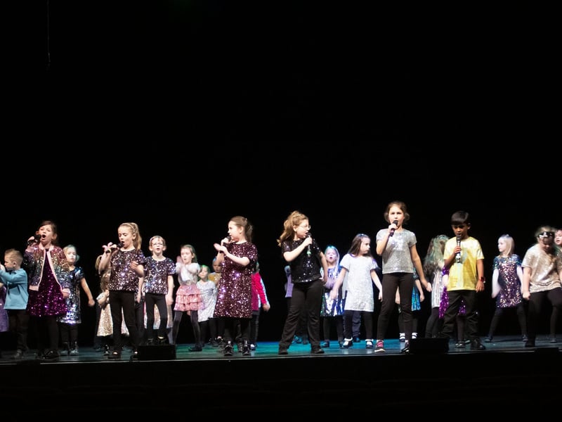 Rising Stars Musical Theatre Group on stage at the New Theatre performing Showstoppers