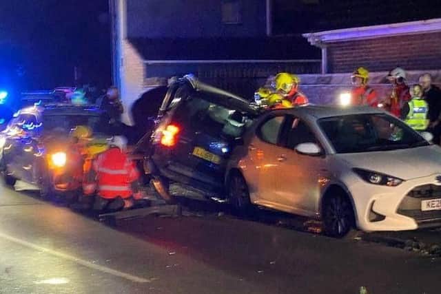 Emergency services at the scene of the crash Photo: Malcolm Smart