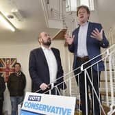 Conservative Party chairman Richard Holden MP (left on stairs) meets Peterborough Conservatives with Peterborough MP Paul Bristow, right on stairs, during his visit to the city.