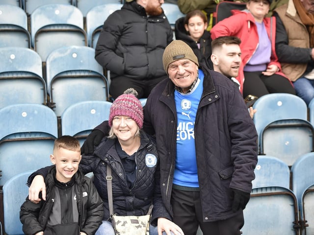 Peterborough United fans watch their side struggle to a 2-2 draw at home to Salford on 4th Nov 2023.