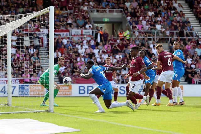 This effort from Ephron Mason-Clark at Northampton Town was ruled out for offside. Photo: Joe Dent/theposh.com.