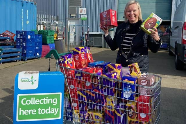 Allison Homes East handing Easter eggs over to Peterborough Foodbank