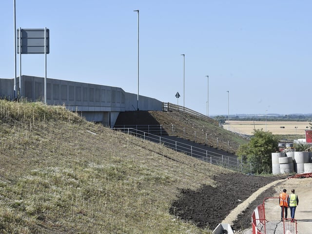Official opening of the new Kings Dyke bridge over the A605 to Whittlesey has been named The Ralph Butcher Causeway (image: David Lowndes)