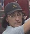Image of a man British Transport Police wish to speak to in connection with luggage theft