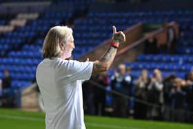 Robbie Savage acknowledges the Posh fans on his managerial debut at London Road. Photo David Lowndes.
