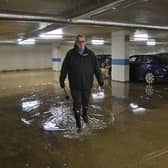 Reg Davies with the flooding problems in the car park at Clarkson House, Fletton Quays