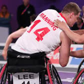 Lee Manning of Team England congratulates Lachlin DaltonTeam Australia on their win in the Men's Wheelchair 3x3 Basketball Semifinal match at the Commonwealth Games. (Photo by Luke Walker/Getty Images)