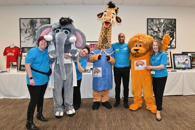 Some of the NWAFT volunteers with the Hospitals’ Charity mascots.