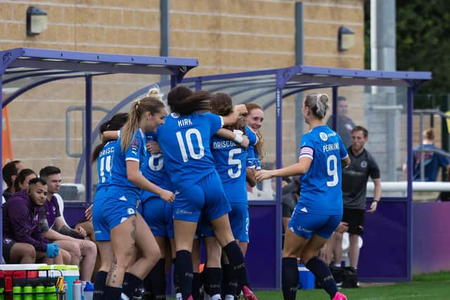 Posh celebrate a goal at Loughborough. Photo: Ruby Red Photography