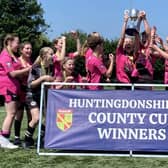 Girls United U16s celebrate their Hunts County Cup FInal triumph.