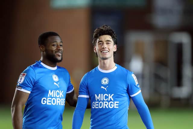 David Ajiboye (left) and Joel Randall of Peterborough United are all smiles at full-time after the win over Shrewsbury. Photo: Joe Dent/theposh.com.