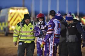 Nicki Pedersen is helped back into the pits after his first heat crash in the meeting with Ipswich. Photo: David Lowndes.