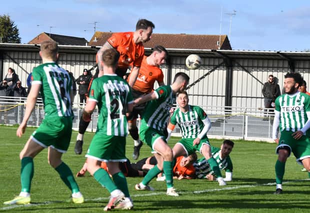 Action from Peterborough Sports (orange) v Blyth Spartans. Photo David Lowndes.