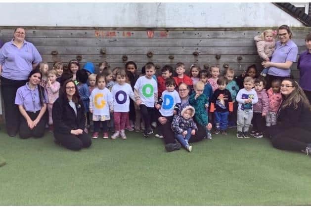 The children and staff at Kiddi Caru Day Nursery &amp; Preschool in Peterborough
celebrating their good Ofsted rating.