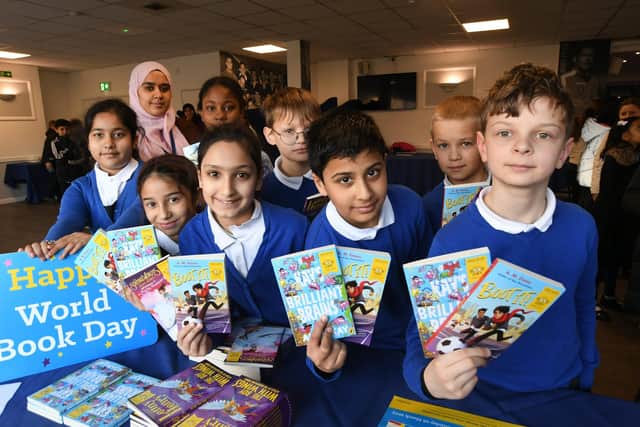 Pupils and staff from The Beeches School attending a Book Week event at the Weston Homes Stadium
