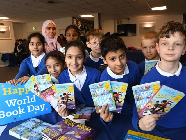 Pupils and staff from The Beeches School attending a Book Week event at the Weston Homes Stadium