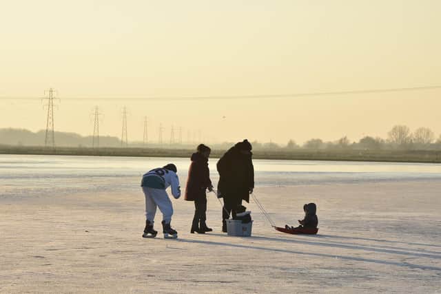 Skaters enjoying the frozen ice at Whittlesey Wash