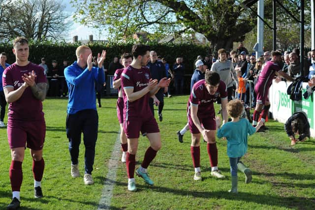 Bourne Town FC celebrate their United Counties Division One title success. Photo Chris Lowndes.