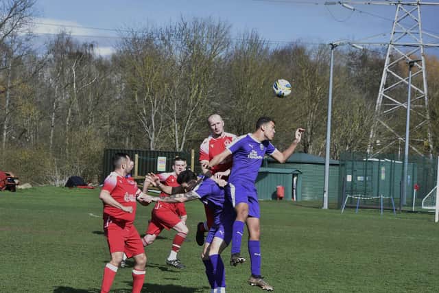 Action from Polonia (red) v Stanground Sports in Division One of the Peterborough League. Photo:  David Lowndes.
