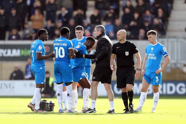Jeando Fuchs limps off. Photo: Joe Dent.