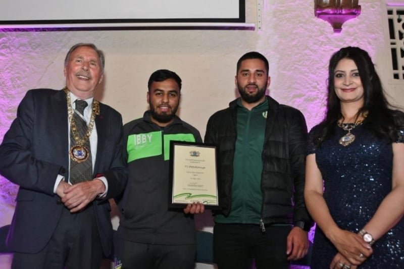 Mayor Alan Dowson and Mayoress Shabina Qayyum with Sports Award winners, Shahzad Hamid and representative, from FC Peterborough.