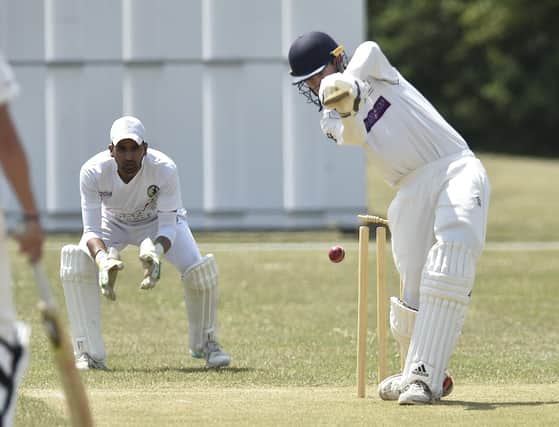 Ben Potter of Burghley Park is bowled by Amandeep Dhindsa of Werrington. Photo: David Lowndes.