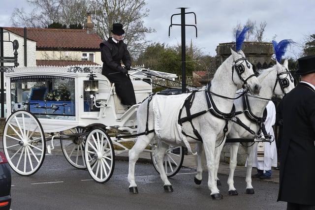 Riain arrived at the service by horse-drawn carriage.