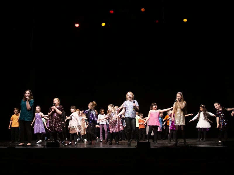 Rising Stars Musical Theatre Group on stage at the New Theatre performing Showstoppers