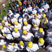 The staff of Peterborough-based Princebuild prepare to take part in the Lincoln 10k run