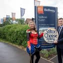Sara Dunleavy, from the Stilton Cheese Rolling Festival committee, and Lewis Bowcutt, Senior Sales Advisor at Bellway, are pictured outside Bellway’s Stilton Gate development on North Street, where this year’s festival parade began. Bellway donated £300 to help stage the event.