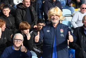 Posh v Burton fans gallery starring a Robbie Savage impersonator.