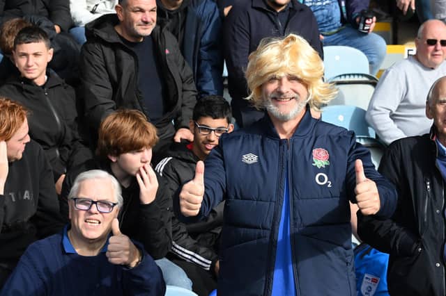 Posh v Burton fans gallery starring a Robbie Savage impersonator.