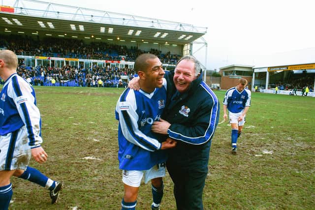 Barry Fry celebrates a Posh derby win over Cambridge United with Francis Green (left).