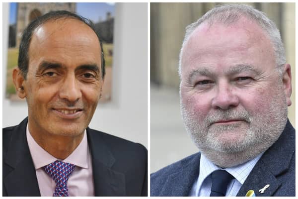From left, Peterborough City Council leader Cllr Mohammed Farooq and Cllr Wayne Fitzgerald, leader of Peterborough City Council's Conservative group