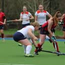 Wisbech Ladies seconds (red) in action against City of Peterborough 4ths. Photo Tim Chapman