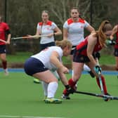 Wisbech Ladies seconds (red) in action against City of Peterborough 4ths. Photo Tim Chapman