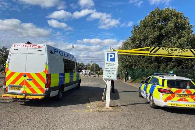 Police dealing with the unauthorised encampment at Wellington Street cap park. Photo: Cambridgeshire Police.