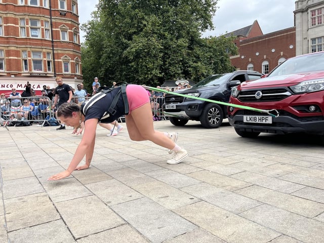 One of the competitors at Peterborough's Strongest Man gets into gear with this challenge
