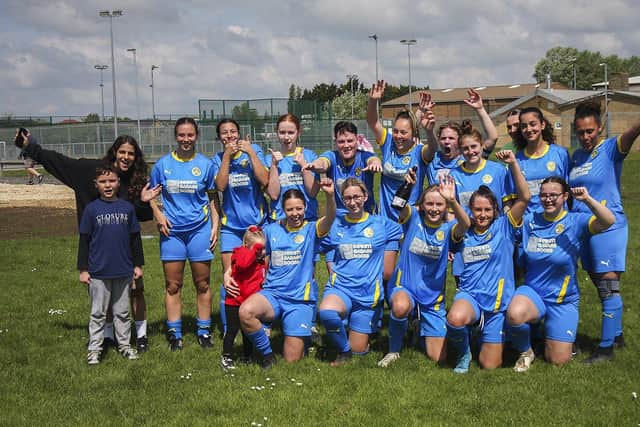 Peterborough Sports Ladies celebrate their Cambs Division Two title success. Photo: Tim Symonds.