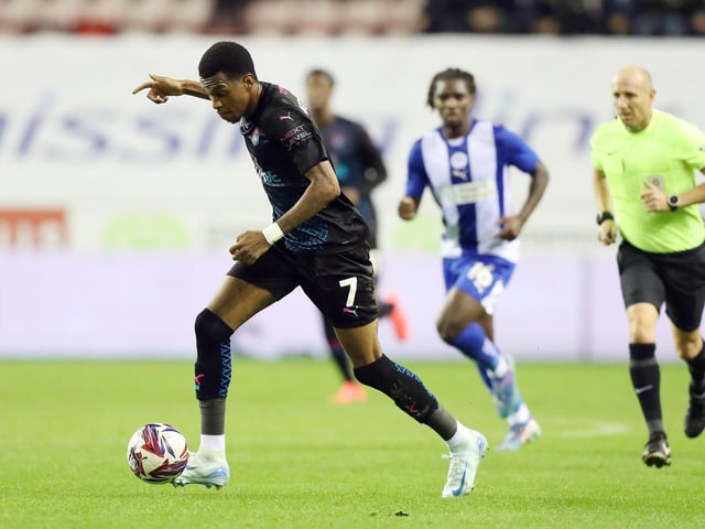 Malik Mothersille in action against Wigan Athletic.