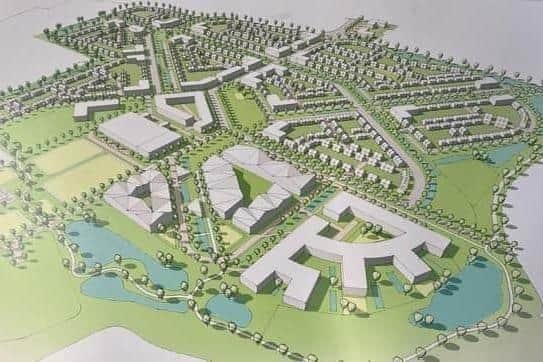 Image showing the planned leisure village in the foreground of the East of England Showground site and the housing beyond.