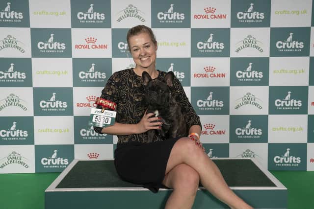 Olivia Timms from Thorney with Sushi, a French Bulldog, which was the Best of Breed winner today (Friday 07.03.25), the second day of Crufts 2025. Photo: BeatMedia / The Royal Kennel Club