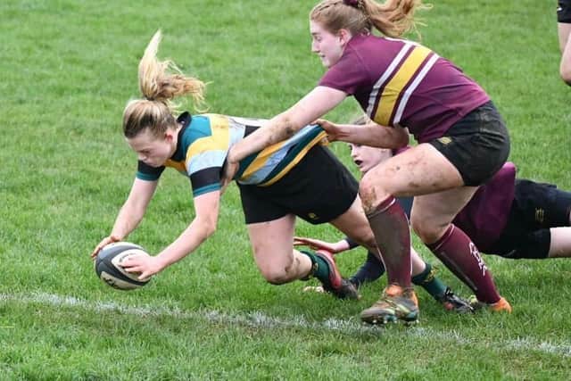 Alice Bennett scoring a try for the East Midlands.