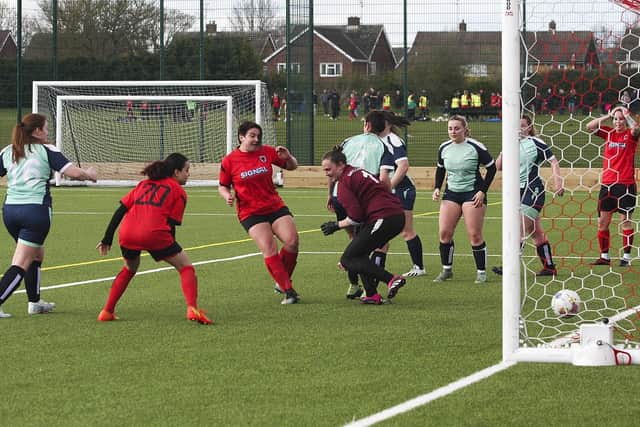 Lauren Miller scores for Netherton United Ladies v Manea. Photo Tim Symonds