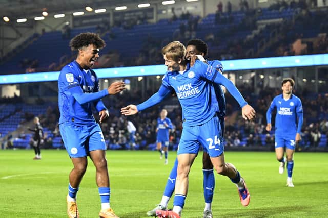 Jimmy-Jay Morgan celebrates his goal for Posh against Aston Villa Under 21s with James Dornelly (left). Photo David Lowndes.