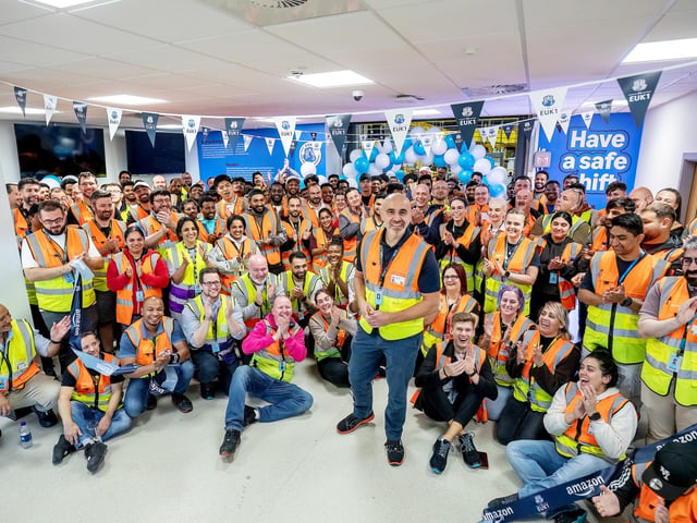 Tomislav Batinic, site leader, with staff at the new Amazon warehouse in Peterborough