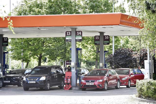 Motorists filling up in Peterborough as fuel prices continue to rise